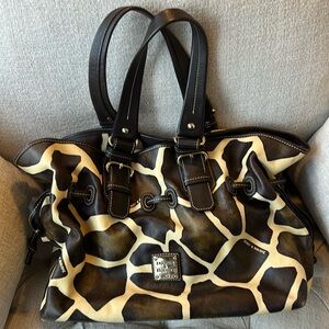 Dooney and Bourke Leather Giraffe Print Tote with Draw string.